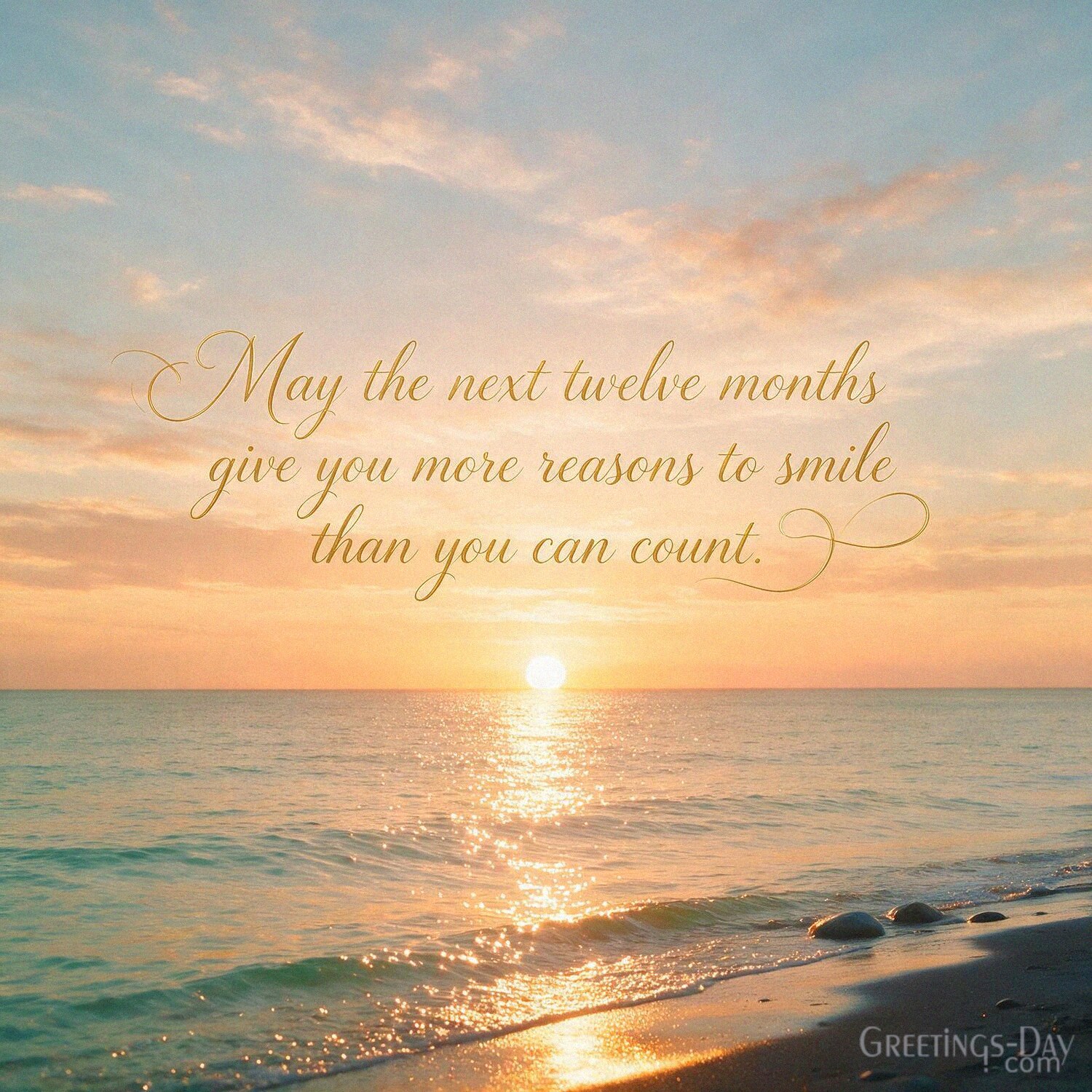 Positive Happy Birthday Quote image with peaceful sunrise featuring “May the next twelve months give you more reasons to smile than you can count.” with the text "May the next twel